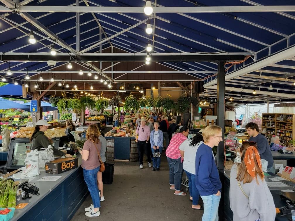 Shoppers inside The Summit market